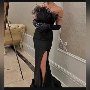 Elegant Black Gown with Feather Detail